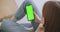 Phone with Green Screen and Chroma Key Closeup. Chromakey Mockup with Tracking Markers and Alpha Matte. POV is Vertical