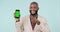 Phone green screen, point or professional black man gesture at online mockup, corporate promo or studio news. Smartphone