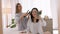 Phone, salon and hairdresser with influencer live streaming hairstyle as stylist is busy with a hair iron. Beauty