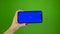 Phone screen is blue chroma key. Green screen