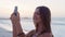 Phone selfie, beach and profile of woman with memory picture of travel vacation, adventure or holiday in Rio de Janeiro