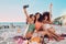 Phone, selfie and women friends on the beach with freedom on a summer adventure on vacation in Mexico. Travel, happiness