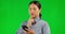 Phone, thinking and woman on green screen typing an idea, question or decision on social media, web or mobile app