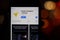 Phone with Yandex Navigator Parking icon on screen with blurry background. Los Angeles, California, USA - 30 November 2019,