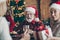 Phot of grandfather positive cheerful smiling in eye glasses spectacles wearing santa hat headwear feeling festive mood