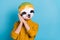 Photo of adorable funny sloth man hands cheeks relax chill free time wear mask yellow shirt isolated blue color