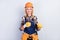Photo of adorable good mood age crafts lady dressed uniform helmet smiling holding tools fiber cable isolated grey color
