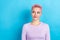 Photo of adorable nice girl with pink dyed hairstyle wear stylish sweatshirt look at sale empty space isolated on blue