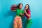 Photo of adorable pretty ladies wear colorful clothes singing boom box karaoke isolated blue color background