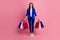 Photo of adorable pretty lady wear blue trendy suit enjoy nice shopping low price clothes isolated on pink color