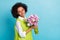 Photo of adorable student age female receive bunch of peonies from boyfriend isolated on blue color background