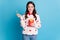 Photo of adorable sweet young lady wear hearts print sweater eating fast food fried potato isolated blue color