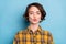 Photo of affectionate girl send air kiss close eyes wear checkered plaid shirt isolated blue color background