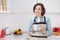 Photo of age dream lady drink tea wear apron jeans shirt at kitchen alone