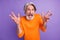 Photo of aged man afraid scared horrified panic worried problem shout isolated over violet color background