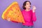 Photo of aged woman show fingers tasty yummy sign hold pizza slice food isolated over purple color background