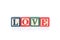 Photo of a alphabet blocks spelling LOVE isolate on white background