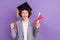 Photo of amazed triumphant schoolkid hold diploma look empty space wear hat grey suit isolated violet color background