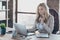 Photo of amazing blond business lady resourceful person looking seriously notebook on table sitting boss chair