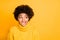 Photo of amazing dark skin lady looking tricky to empty space wear warm knitted sweater isolated yellow color background