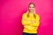 Photo of amazing lady with crossed arms wear yellow hoodie pullover isolated pink background