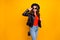 Photo of amazing lady doing foreign shopping spending best vacation wear stylish outfit isolated yellow background