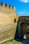 Photo of ancient stone castle with many hight towers in Khotym