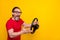 Photo of angry furious guy pensioner dressed red t-shirt glasses auto rider screaming isolated yellow color background