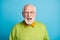 Photo of angry pensioner old man yell crazy face wear specs green pullover isolated blue color background