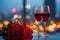 Photo Anniversary elegance red wine glasses, red roses, colorful city lights