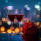 Photo Anniversary elegance red wine glasses, red roses, colorful city lights