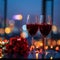 Photo Anniversary elegance red wine glasses, red roses, colorful city lights
