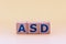 Photo on ASD autism spectrum disorders theme. wooden cubes with the abbreviation