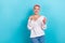 Photo of astonished cheerful stylish lady arm breast look empty space unexpected unbelievable offer isolated on blue