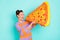 Photo of astonished positive girl hands hold large paper pizza collage open mouth isolated on blue color background