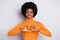 Photo of attractive afro american woman make fingers heart figure good mood isolated on grey color background