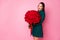 Photo of attractive charming fancy lady red lips hold large roses bouquet secret admirer boyfriend birthday compliment