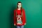 Photo of attractive pretty cheerful long-haired girl wearing mask casual deer print dotted jumper isolated green color