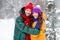 Photo of attractive sweet girlfriend boyfriend dressed vests smiling cuddling enjoying walking snow outdoors forest