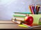 Photo back to school concept books colored pencils and apple. Generative AI