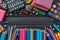 Photo Back to school supplies background assorted educational tools displayed