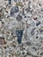 Photo background beautiful stones protrude from the concrete slab