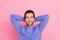 Photo of beard cool guy look promotion wear blue pullover isolated on pastel pink color background