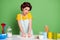 Photo of beautiful girl prepare homemade cake knead raw fresh dough make lips pouted wear yellow dotted t-shirt hair