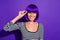 Photo of beautiful lady touch hand new specs glad good sight wear wig striped pullover isolated purple background