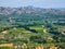 Photo of a beautiful landscape with a view of the Alpilles mountains, olive groves, fields and nature from the heights of Les Baux
