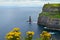 Photo of beautiful scenic sea and mountain landscape. Cliffs of Moher, west coast of Ireland, Atlantic ocean