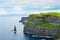 Photo of beautiful scenic sea and mountain landscape. Cliffs of Moher, west coast of Ireland, Atlantic ocean