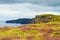 Photo of beautiful scenic sea and mountain landscape. Cliffs of Moher, west coast of Ireland, Atlantic ocean