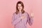 Photo of beautiful woman hand on chest make promise tell the thruth oath isolated pink color background